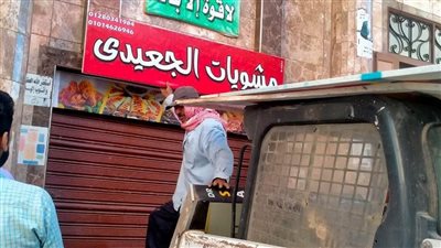 إزالة الإعلانات غير المرخصة بمركز ومدينة الزرقا بدمياط 