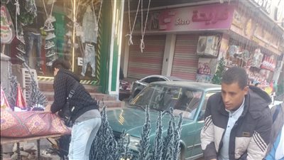 حملات بشارع عثمان محرم لمنع التعدي على الطريق العام للمحال التجارية