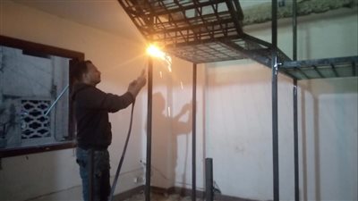  ازالة سلم حديدى  لعقار بالمنصورة 