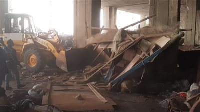 إزالة تعديات واسترداد أراضى أسفل الطريق الدائري بحي البساتين - صور