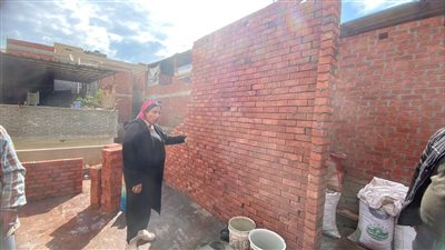  إزالة جدران دور ثالث بعقار مخالف في المنصورة