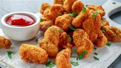 للدايت.. طريقة عمل ناجتس الدجاج المشوي