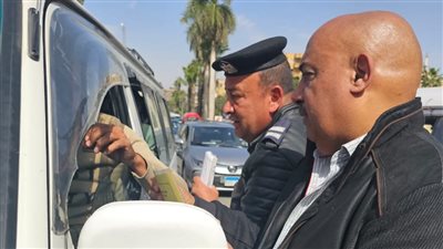 ضبط 160 سيارة سرفيس غير ملتزمة بالتعريفات المحددة لخطوط السير بالجيزة