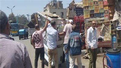 حملات أمنية بشارع العريش فى فيصل لضبط الباعة الجائلين