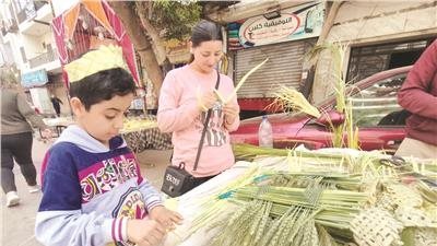 بالسعف والزيتون المزين استقبلوا المسيح في أحد الشعانين .. هل عطلة أم لا؟