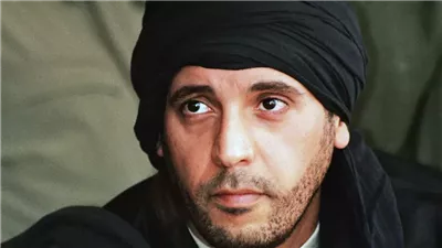  صورة نجل القذافي تثير جدلًا والحكومة ترد