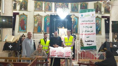 توزيع لحوم مجاناً على 500 أسرة بكنيسة مارجرجس ومار مرقس الكبرى بمنفلوط 