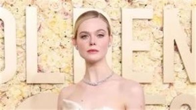  إيل فانينغ تبرز أنوثتها بالتل المزين بالزجاج في حفل ميت غالا