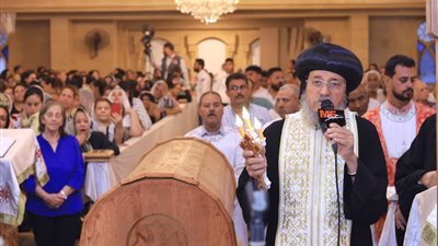 أقباط إسنا يحتفلون بعيد إستشهاد الأم دولاجى وأولادها الأربعة 