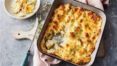 صينية البطاطس بالكريمة.. وصفة غنية وسهلة التحضير لمائدة شهية