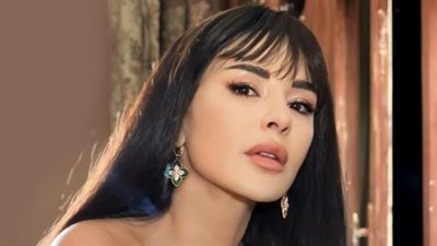 ماغي بو غصن تبهر شرطة الموضة بالأسود المكشوف (صور)