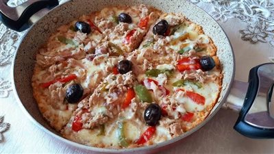 بيتزا سريعة بالخبز.. وصفة سهلة ولذيذة لتحضيرها في المنزل