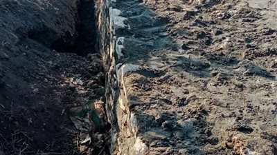  استمرار الاعمال في انشاء الحائط الساند لمعالجه دائرة انزلاق  جسم طريق  شبشير القرشية