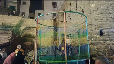 البهجة على وجوه الأطفال في الليلة الختامية لمولد الإمام الحسين