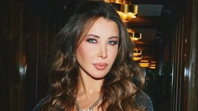 شرطة الموضة يكشف عمر فستان نانسي عجرم في عرض أزياء إيلي صعب