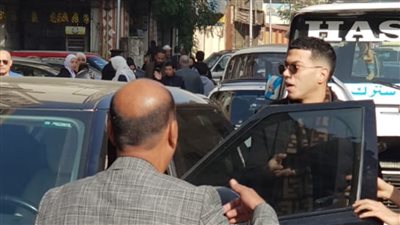 إمام عاشور يتصالح مع فرد الأمن بعد أزمة الشيخ زايد (صورة)