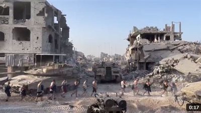 الكادر الطبي ومرضى مستشفى كمال عدوان شبه عراة تحت تهديد السلاح 