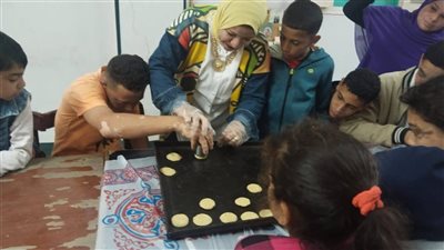 متحف كوم أوشيم يقيم ورشة كحك العيد بمكتبة مطرطارس بالفيوم