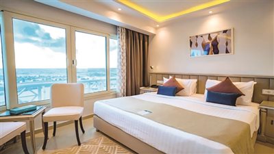 اﻗﺾ ﻋﻴﺪك ﻓﻰ ﻓﻨﺎدق »ﺻﻦ راﻳﺰ« اﻹﺳﻜﻨﺪرﻳﺔ واﻟﻌين اﻟﺴﺨﻨﺔ