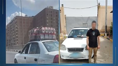 ضبط سائق سمح لشخص بالجلوس على الجزء الأمامي للسيارة خلال سيرها