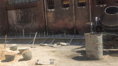 إستبدال نقاط تجميع القمامة بأحواض من الزهور والأشجار بحي غرب الفيوم