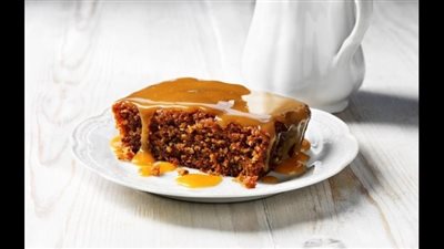 صحية ولذيذة.. طريقة عمل كيكة التمر بالقشطة