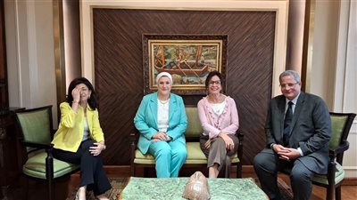 تعاون بين 