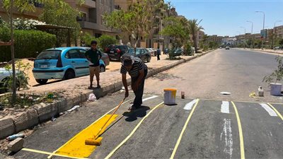 جهاز حدائق أكتوبر يستكمل أعمال تنفيذ المطبات بالطرق و المحاور الرئيسية