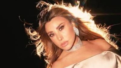 نجوي كرم تطل بالساتان الناعم 