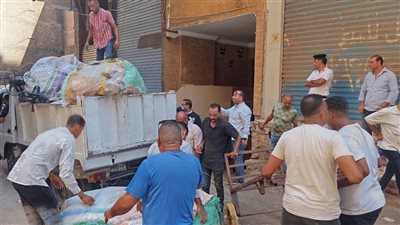 حملات مكثفة ببولاق الدكرور ترفع الإشغالات والتعديات تمهيدًا لرصف شارع مصرف زنين