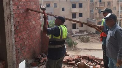 جهاز حدائق أكتوبر يواصل إزالة المخالفات بمنطقة 