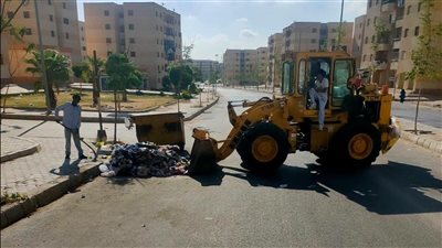 فرق النظافة بجهاز حدائق أكتوبر تواصل أعمالها بمختلف أنحاء المدينة