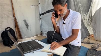 أستاذ جامعي بغزة 